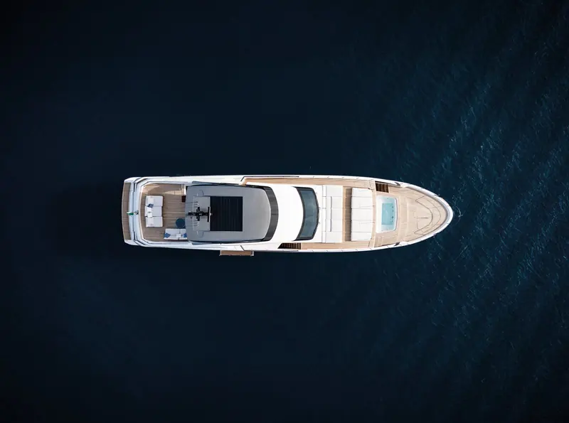 Directly overhead, showing the asymmetric layout that gives the model its name: a single wide walkway to starboard instead of two symmetrical side decks.