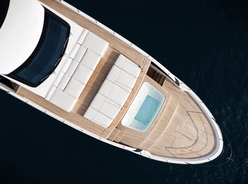 Overhead of the foredeck lounge and a sunken spa pool set into the asymmetric deck plan.