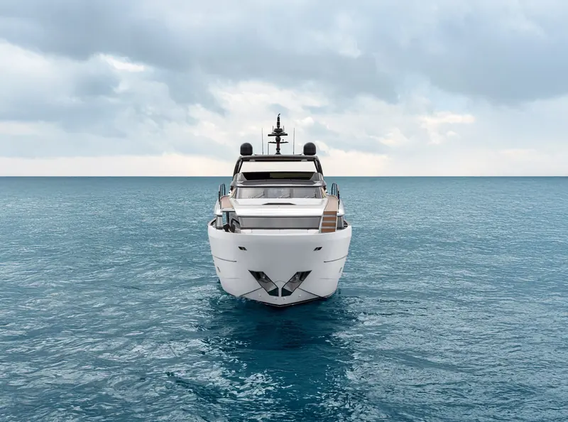 A bow-on view showing the model's sharp stem and the asymmetric arrangement of the foredeck.