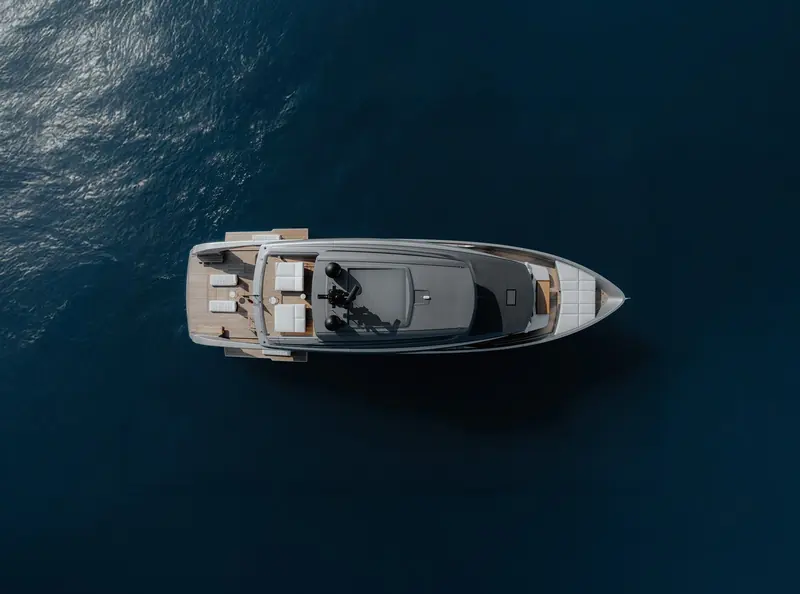 Directly overhead, showing the SX100's beach-club-style beam and open deck plan.