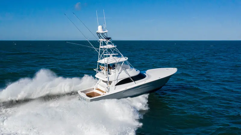 A Viking 54 Convertible running hard offshore.