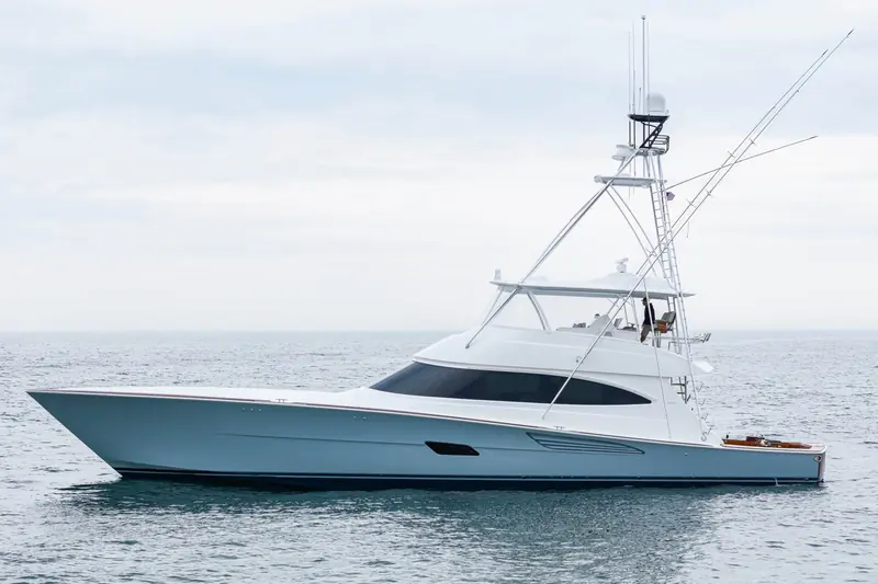 The Viking 82 Convertible running, showing the enclosed-bridge profile.