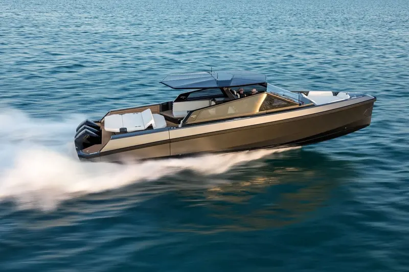 Underway off a Florida shoreline in bronze-tinted hull paint, wake fanning out behind the twin outboards.