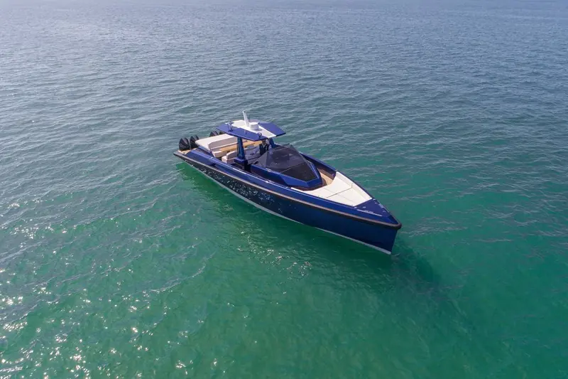 Detail of the transom steps and outboard mounts with the swim platform folded up for passage.