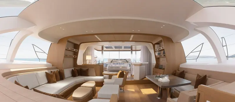 The Swan Alloy 44's saloon, designed by Studio Liaigre, opens onto the deck through full-height glazing.
