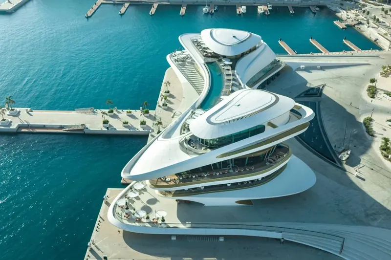 AMAALA Yacht Club's cantilevered terraces, designed by HKS Architects around the Red Sea coastline's rock formations