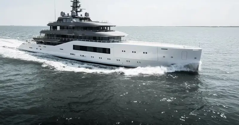 Pangea on sea trials, her bow wave breaking clean at speed during the testing that preceded her October 2025 delivery.