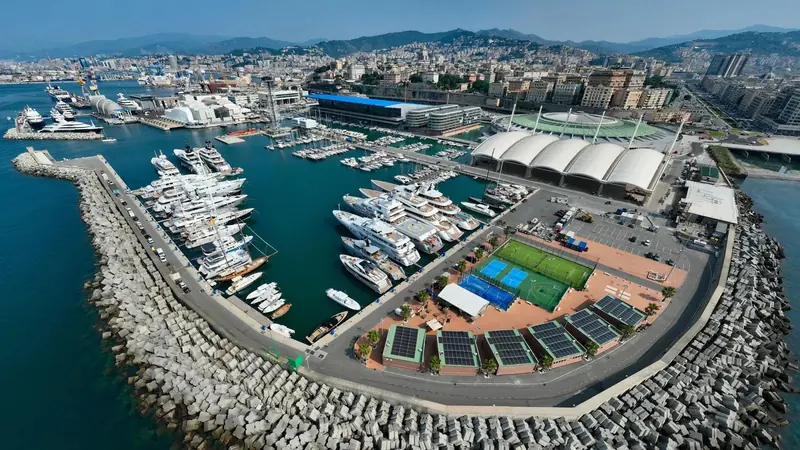 An aerial view of the Genoa waterfront shows the yard's rooftop solar array, part of the 1-megawatt system judged to cover 53 percent of the site's annual energy use.