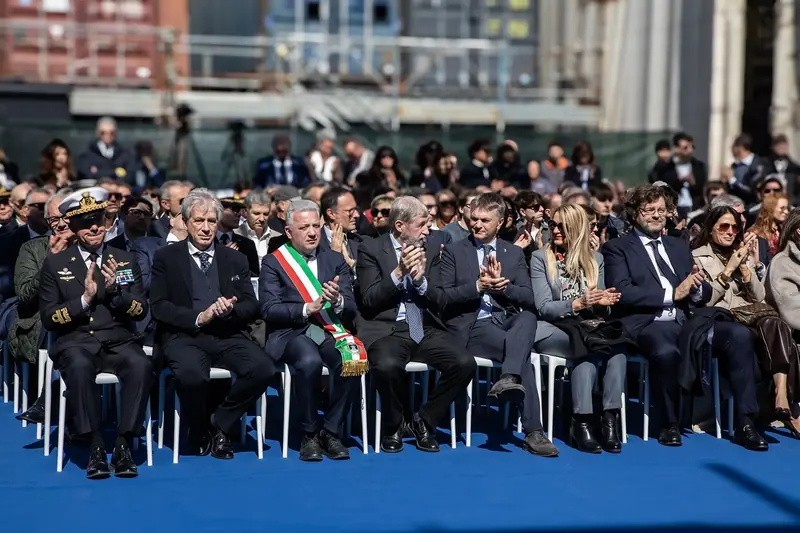 The front row at the launch: the Mayor of La Spezia in the tricolour sash, with regional and naval officials. Baglietto is owned by the Gavio Group and the yard is a significant Ligurian employer.