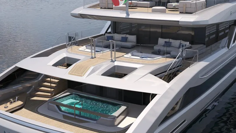 RENDER, not a photograph: Baglietto's own image of the T60 aft decks and pool. No photographs of the delivered yacht's exterior have been released, and her first public showing is Monaco in September.