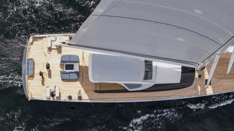 Looking aft over the coachroof, Alice's name is painted on the hull below deck level, port side.