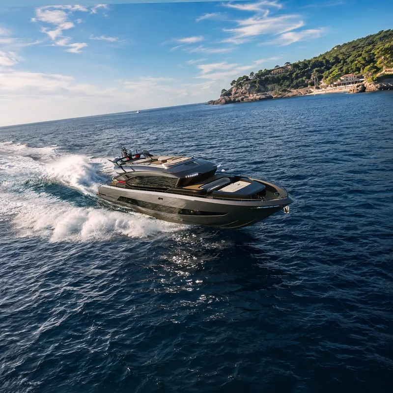 The AB110 running fast off the Mediterranean coast, her carbon-fibre exterior visible at speed.