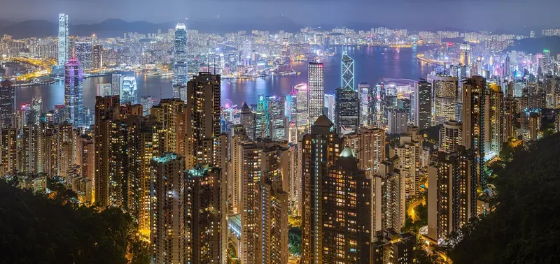 Hong Kong's skyline at night from Victoria Peak. TGG Group's investment is a bet that a region with roughly a third of the world's ultra-wealthy is underserved by yacht builders designing specifically for them.