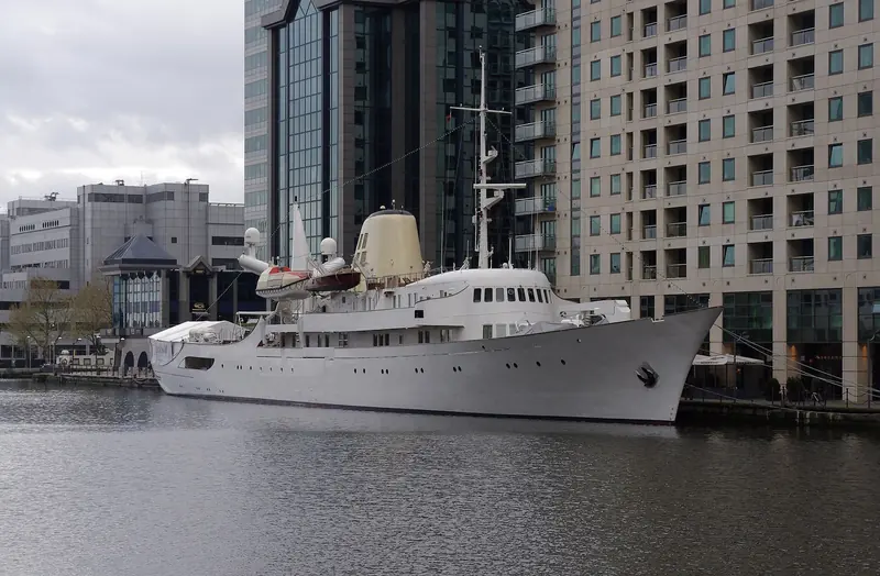 Christina O moored on the City Canal at Canary Wharf, London, during one of her working charter seasons.