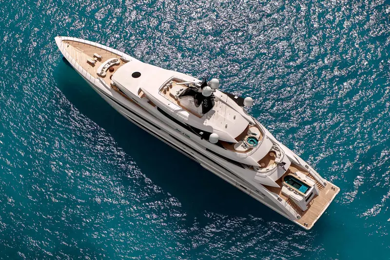Amor a Vida from above, showing the beach club and pool aft and the owner's foredeck terrace forward, on delivery to Moran Yacht & Ship.