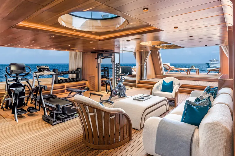 The beach club gym, part of a lower deck that also carries a sauna, steam room and a spa treatment room with a drop-down sea terrace.