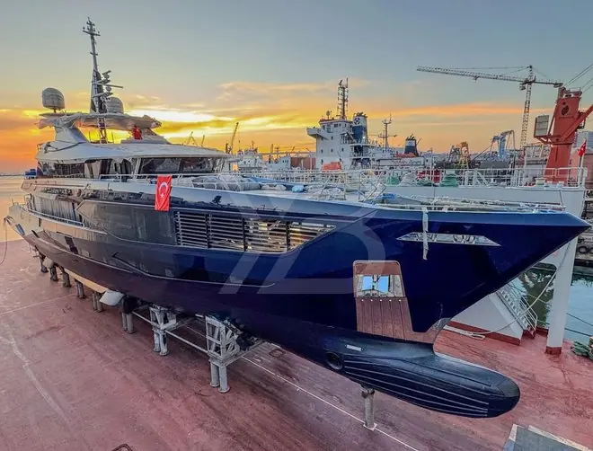 Queen Yaz supported in the yard cradle at Dearsan's Tuzla facility. The steel hull and aluminium superstructure were completed by January 2025, about a year before this shot.