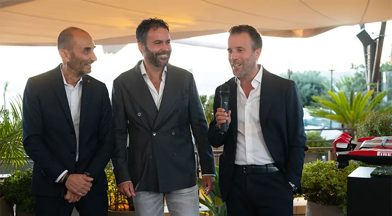 Executives from Ducati, Pirelli and SACS Marine with the model at the 10 September world premiere.