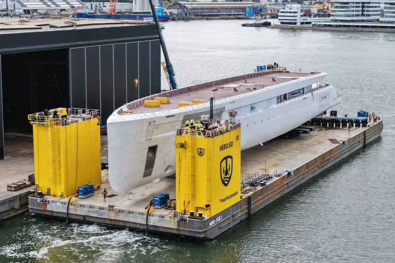 The 83.25-metre hull rolled out of the Casco en Sectiebouw Rotterdam shed, where her steel structure was built before the move to Amsterdam for outfitting.