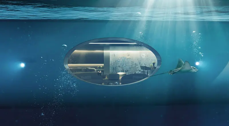 The underwater lounge's oval window, positioned below the waterline for its own view out.