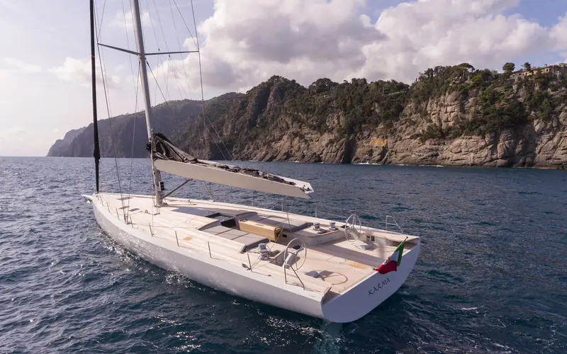 MD75 Karma under sail off the Ligurian coast. The MD75 lost to the fire was a sister hull of this same performance-cruiser line.