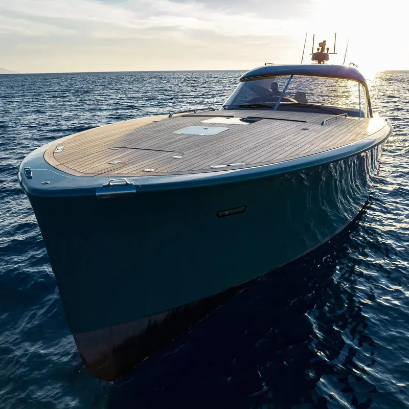 An MD51 Power underway. The destroyed MD51 Power was the smaller of the two motoryachts lost, the model that took Maxi Dolphin into powerboats in 2007.