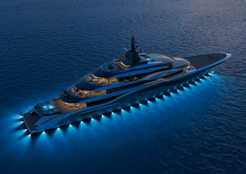 ISA's night rendering, underwater lighting traced along the full waterline from bow to the aft beach club platform.