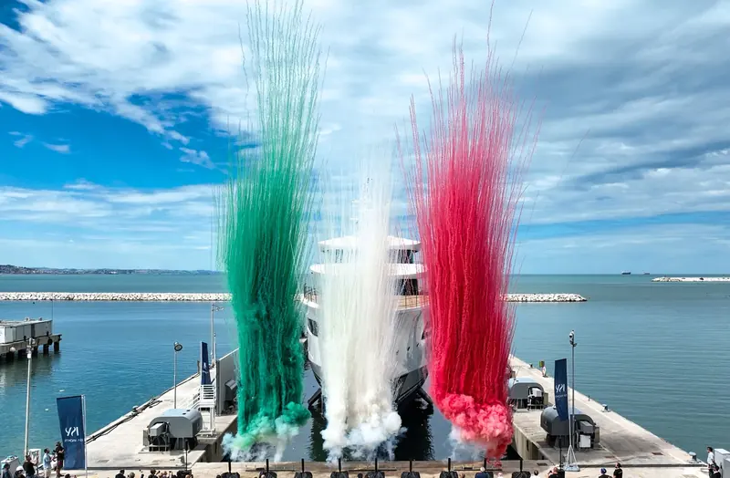 Green, white and red smoke marks the christening of Belita at ISA's Ancona yard, 15 September 2026 - the yard's new 79.8-metre flagship.