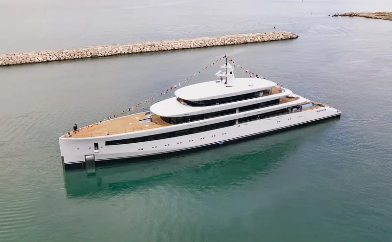 Belita afloat for the first time, still inside the breakwater at Ancona - her aluminium superstructure and Espen Oeino exterior lines visible in profile.