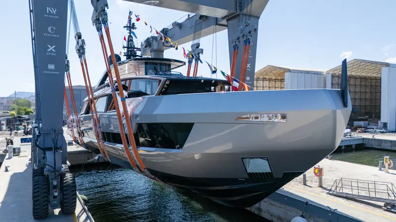 Fast Naan's bow in ISA's travel lift at Ancona on 25 August 2026, the moment the first Viper 130 hull went from shed to water.
