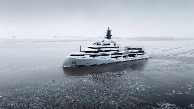 O3's full profile on the river, showing the extended aft deck built out beneath the helideck. At 109 metres and 6,561 GT she is one of only a handful of Ice Class 1B yachts her size.