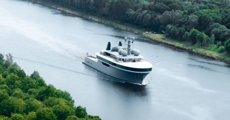 Approaching head-on down the canal. The steel hull and aluminium superstructure are the trade-off behind the ice classification: more strength, less weight to carry it.