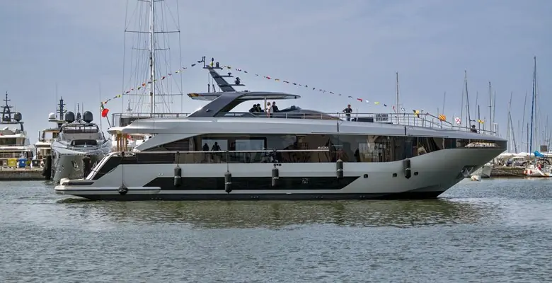 Flags up for the christening. MAIORA is lettered along the hull side, the only badge fitted at this stage of finishing.