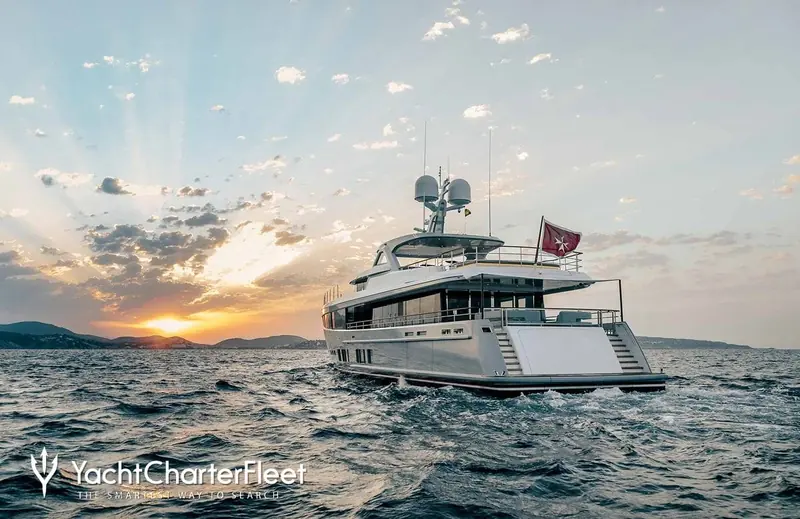Delta One under way at dusk in the Balearics. Nine years after her launch, she has just finished a full system-and-finish refit at Mulder's own yard.