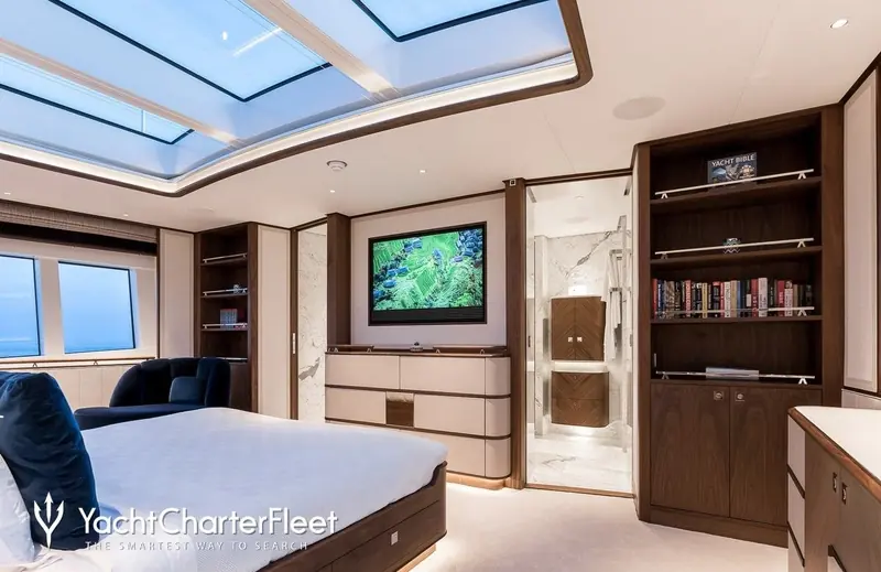 The full-beam owner's suite forward, with its own private seating area - one of five staterooms carried on 36 metres.