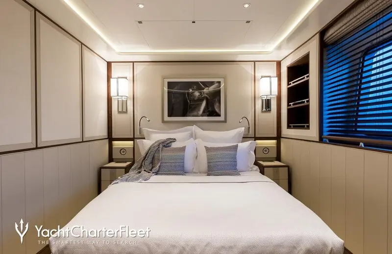 The formal dining table, set for evening service. Delta One can host up to ten guests across her five cabins.