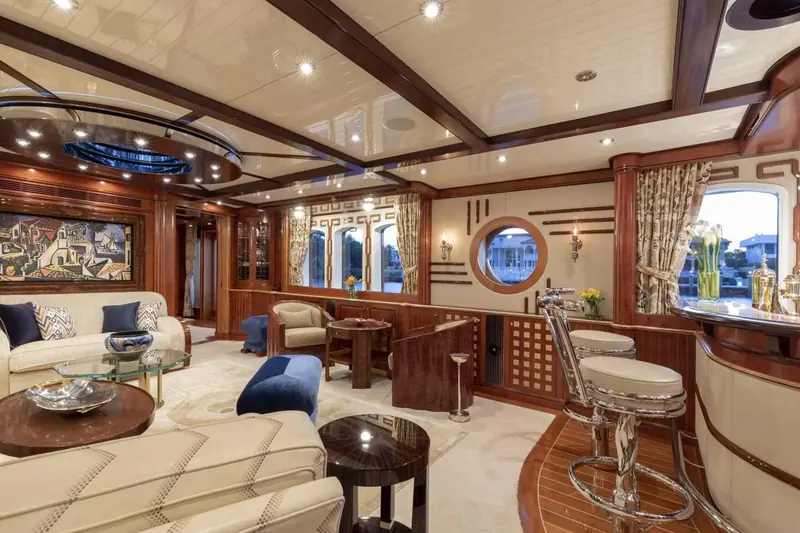 A second saloon carries Macassar ebony inlay against Madrona Burl panelling, the showstopping woodwork the interior is best known for.