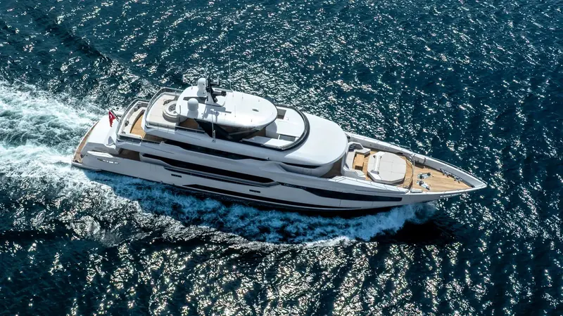 An aerial view shows the 480GT profile Alfa Marine Design drew around twin Caterpillar engines and a steel hull.