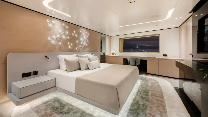 One of five staterooms; the yacht sleeps up to 12 guests across an owner's suite, two doubles and two twins with Pullman berths.