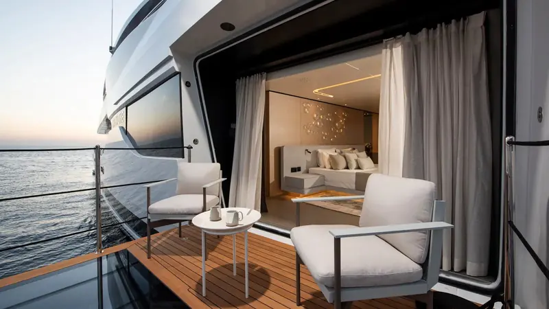 A private terrace off one of the guest cabins, part of the outdoor living space Red Yacht Design built into every deck.