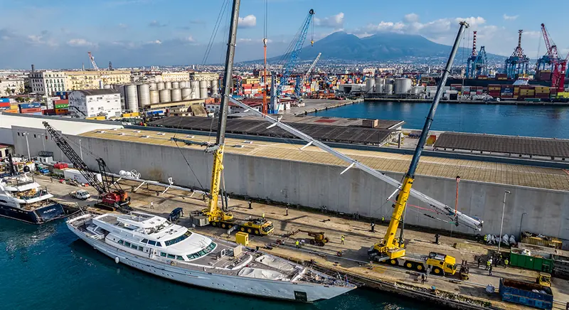 Palumbo's Naples shipyard, the group's 57-year-old headquarters, seen from the air with Mount Vesuvius on the skyline - one of the seven sites now branded Palumbo Upfit.