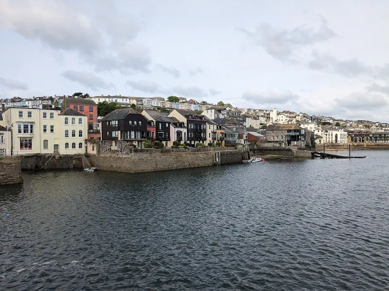 The Falmouth waterfront across the water from the docks. Crew live here for the length of a programme, and a two-year rebuild like Seawolf's makes that a real consideration for an owner choosing a yard.