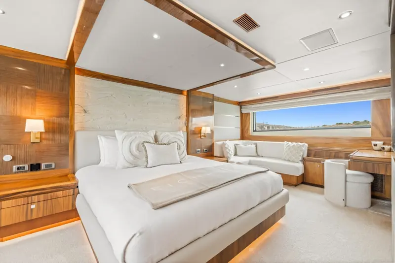 The full-beam owner's suite on the main deck, one of the interior spaces carried through the 2022 refit.