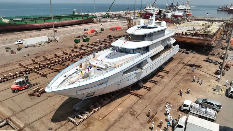 Al Hanem 2 moved down the yard on rail cradles ahead of launch.