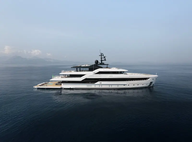 Broadside in a Mediterranean haze, hull number one of the 50Steel series carries her methanol fuel cell without giving up the flush, glazed sides of a conventional Sanlorenzo.