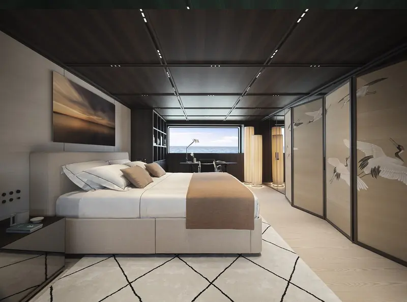 One of five guest cabins, finished in Lissoni's quieter register with a working desk rather than a second sofa.