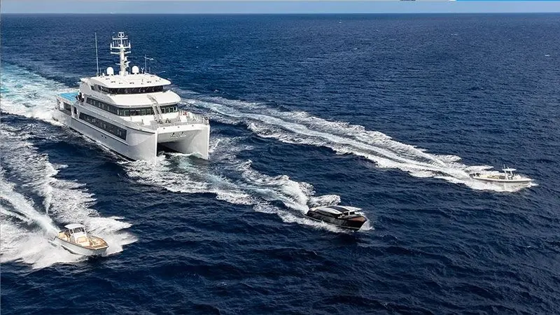 Wayfinder, ShadowCat's proven 68-metre platform reportedly built for Bill Gates, running three tenders at once, the sea-state-rated launch system the Foundation Series inherits.