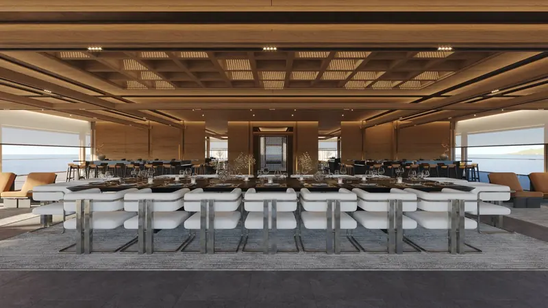 The formal dining room, seated for the scale of a nine-stateroom, 18-guest yacht with a 49-strong crew.
