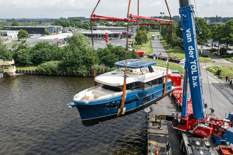 Hull 6701, the first Ocean Explorer 67, craned into the water at Steeler's yard on 4 June 2026 - two years, almost to the week, after her owners first approached the yard at boot Dusseldorf.