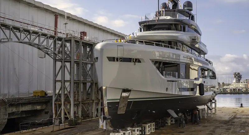 The first Tankoa TX450 in the yard at Genoa on launch day, 31 August 2026, a fully custom 45-metre kept to 405 GT.